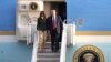 Президент Дональд Трамп и первая леди Мелания Трамп спускаются по трапу самолета в аэропорту Прествик в Эйршире, Шотландия, 13 июля 2018 года