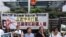 香港16个团体在中联办门前集会，要求中国政府停止压迫新疆维族人 （美国之音记者 申华报道）