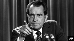 FILE - In this March 15, 1973, file photo President Nixon tells a White House news conference that he will not allow his legal counsel, John Dean, to testify on Capitol Hill in the Watergate investigation.