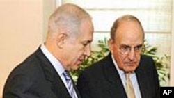 内塔尼亚胡(左)和米切尔周五会晤