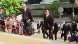 被控毆打抗議者的七名香港警察受審