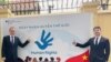 Các nhà ngoại giao Đức bên cạnh poster Ngày Nhân quyền Thế giới 10/12/2024. Photo German Embassy Hanoi.