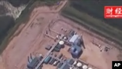 加拿大油砂矿用原位抽取法开采油砂