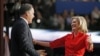 Republican presidential nominee Mitt Romney (l) hugs his wife Ann on stage at the Republican National Convention in Tampa, Florida, Aug. 28, 2012. 