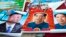 FILE - In this Feb. 5, 2015 file photo, vendors sell posters of Chinese President Xi Jinping, left, and Communist Party founder Mao Zedong, center and right, on a street of Gujiao in northern China's Shanxi province. 