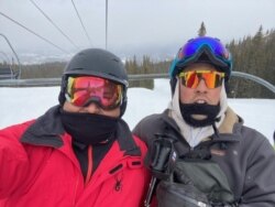 Carlos Gavidia and his son Casen on the slopes in Aspen.