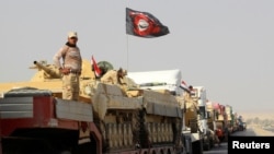 2016年10月12日,伊拉克政府軍車隊向摩蘇爾前進。