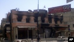 叙利亚政府军和反政府武装在首都大马士革南面进行战斗后的街头情况