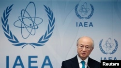 Protesters gather in front of the Supreme Court holding signs with the image of Judge Brett Kavanaugh that read &quot;Kava Nope&quot; and &quot;We Believe Christine Blasey Ford&quot; on Capitol Hill in Washington.