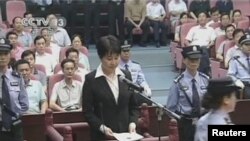 前政治局委員薄熙來妻子谷開來星期一在合肥被判處死緩