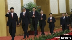 中国共产党新的政治局常委2012年11月15日在北京人民大会堂亮相