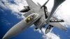 2012年9月10日美国空军F-15E攻击鹰式战斗轰炸机进行空中加油训练（资料图片）