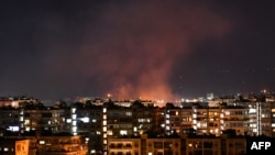 Smoke billows following an Israeli airstrike targeting south of the capital Damascus, Syria, July 20, 2020.