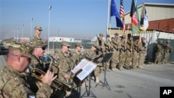 美國及北約部隊2014年12月8日在喀布爾舉行降旗儀式，標誌結束在阿富汗13年的戰鬥使命。