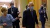 FILE - Senate Republican Majority Leader Mitch McConnell walks past reporters on Capitol Hill in Washington, Dec. 15, 2020. 