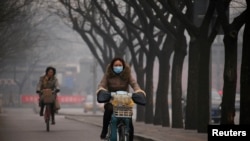 北京空气污染严重（2014年资料照片）