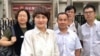 王全璋妻子李文足(左二)與律師赴天津要求會見(7月31日 網絡圖片)