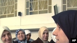 Space shuttle Discovery is rolled toward the transfer ceremony at the Steven F. Udvar-Hazy Center. (NASA/Carla Cioffi)