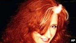 才华横溢的蓝调摇滚女吉它手、词曲作家兼歌手Bonnie Raitt