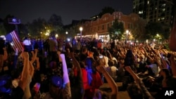 资料照片-抗议者9月15日在圣路易斯市集会。此前法官判定前白人警察杰森·斯托克利2011年打死黑人安东尼·拉玛尔·史密斯的一级谋杀罪不成立。