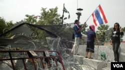 泰国反对派停止激烈示威 政府机关对抗议者开放