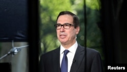 美國財政部長姆努欽。(2018年5月網1日資料照。)