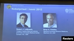 羅伯特萊夫科維茨(右)和布萊安科比爾卡(左)