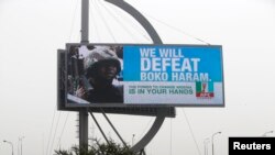 A billboard campaigning for All Progressives Congress party (APC) is seen at Adeniji district in Lagos, Nigeria, January 7, 2015. 