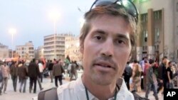 这张没有注明日期的照片显示的是美国记者詹姆斯•弗莱在利比亚班加西。