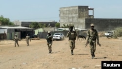 Members of the Amhara Special Force return to the Dansha Mechanized 5th division military base after fighting against the Tigray People's Liberation Front (TPLF), in Danasha, Amhara region, near a border with Tigray, Ethiopia, Nov. 9, 2020. 